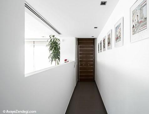 خانه مینیمالیست با طراحی توسی و سفید