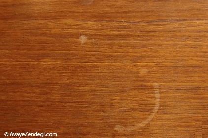 چگونه از شر لکه های آب روی سطوح چوبی خلاص شویم؟